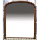 A VICTORIAN OAK OVERMANTEL MIRROR, C1880, WITH LOW ARCHED, MOULDED FRAME, 131CM H X 115CM W Requires