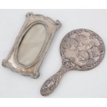 AN EDWARDIAN SILVER PHOTOGRAPH FRAME, THE MOUNT EMBOSSED WITH BELLFLOWERS, 18.5 X 11CM, BY MARKS &