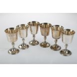 A SET OF SIX ELIZABETH II SILVER GOBLETS ON BALUSTER STEM AND FLARED FOOT, 98CM H, BY T HILL,