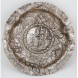 HASEATIC LEAGUE. A DANZIG SILVER REPOUSSE DISH, 17TH C, WITH A CENTRAL SCENE OF A GRAPE HARVESTER AT