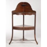 A GEORGE III INLAID MAHOGANY CORNER WASHSTAND, C1770, THE BACK WITH QUARTER QUADRANT SHELF, THE