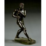 A BRONZE STATUETTE OF AN ATHLETE AFTER THE ANTIQUE, 20TH C, DARK GREEN PATINA RUBBED IN PLACES, 25CM