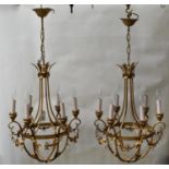A PAIR OF GILTMETAL CHANDELIERS, 20TH C, OF BAG FORM WITH FESTOONS HANGING FROM THE SIX LIGHTS, 17CM