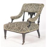 AN AESTHETIC MOVEMENT UPHOLSTERED ARMCHAIR, C1885, THE STUFFED OVER BACK, ARM PADS AND SEAT IN