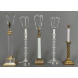 A PAIR OF CLEAR GLASS BOBBIN KNOPPED CANDLESTICK LAMPS, 20TH C, 41CM H EXCLUDING FITMENT, A BRASS