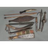 A SMALL COLLECTION OF ETHNIC AND OTHER WEAPONS, TO INCLUDE A BOOMERANG, WOOMERA, DAGGER (JAMBIYA),