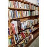 NINE SHELVES OF BOOKS, MISCELLANEOUS GENERAL SHELF STOCK TO INCLUDE SHAKESPEARE AND ENGLISH