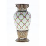 A FRENCH SILVER GILT MOUNTED PORCELAIN VASE, C1900, PAINTED WITH ROSE TRELLIS BETWEEN FESTOON