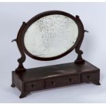 A GEORGE III STYLE TOILET MIRROR, C1905, THE BEVELLED OVAL PLATE ON PAIR OF SHAPED UPRIGHTS, THE