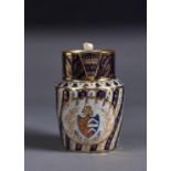 A CHAMBERLAIN'S WORCESTER SPIRALLY FLUTED BLUE AND GILT ARMORIAL JUG, C1800, ENAMELLED TO THE