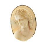 AN IVORY CAMEO, 19TH C, CARVED WITH THE HEAD OF A BACCHANTE, MOUNTED IN A GOLD BROOCH WITH BASE