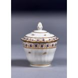 A NEW HALL SPIRALLY FLUTED ROUND SUGAR BOX AND COVER, PATTERN 202, C1790, WITH BLUE, PUCE AND GILT