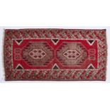 A RED GROUND RUG, 192 X 100CM Condition report