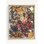 MISCELLANEOUS AND MODERN COSTUME JEWELLERY, MAINLY BEADS AND A STRATTON COMPACT Condition