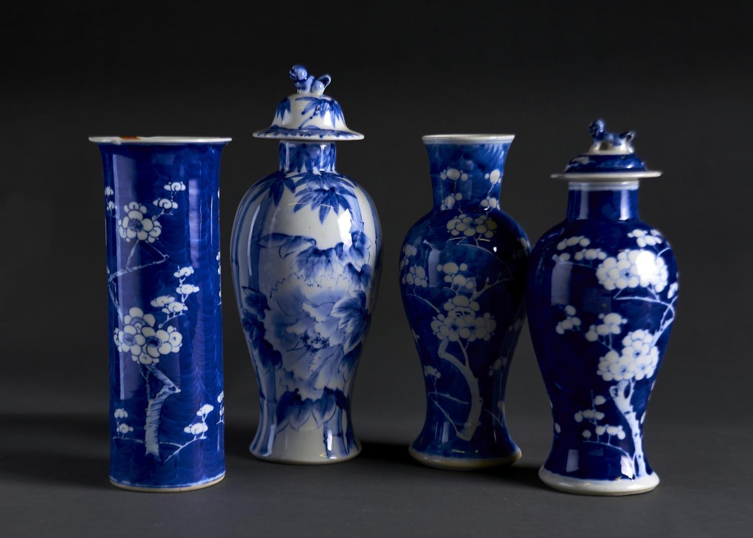 A CHINESE PRUNUS-ON-CRACKED-ICE BLUE AND WHITE VASE AND THREE OTHERS, TWO WITH COVER, EARLY 20TH C