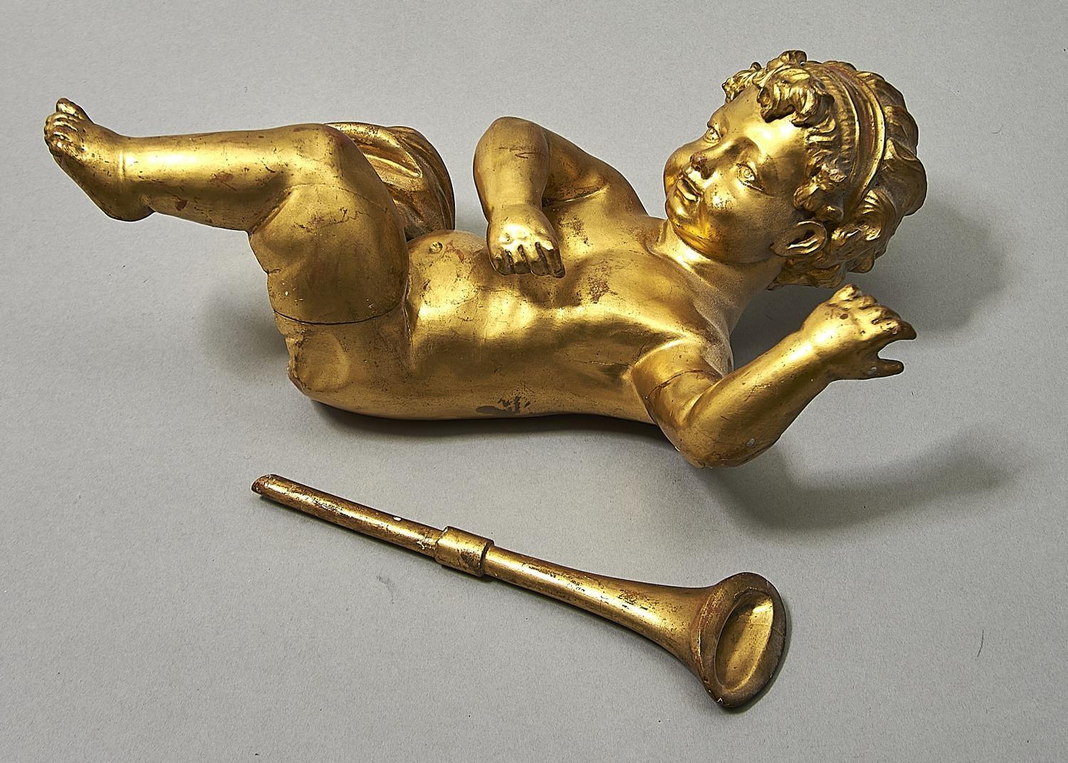 A GILTWOOD FIGURE OF A CHILD, 19TH/20TH C, HOLDING A TRUMPET, 39CM H Condition reportTrumpet