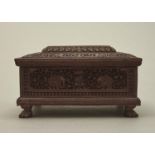 AN INDIAN SANDALWOOD CASKET AND COVER, MYSORE PRESIDENCY, LATE 19TH C, PROFUSELY CARVED WITH