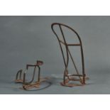 AN IRON SADDLE RACK AND ANOTHER Condition reportComplete; rust pitted