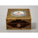 A VICTORIAN PIERCED GILT BRASS AND VELVET COVERD STATIONERY BOX, C1870, THE SLOPING LID MOUNTED WITH