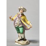 A MEISSEN FIGURE OF A YOUTH, 20TH C, IN PALE GREY HAT, YELLOW COAT AND GREEN BREECHES, ON