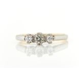 A THREE STONE DIAMOND RING, IN GOLD, 2.6G Condition reportOne of the smaller stones with black