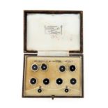 AN ART DECO DIAMOND, BLACK ONYX AND WHITE GOLD GENTLEMAN'S DRESS SET, OF OCTAGONAL CUFFLINKS,