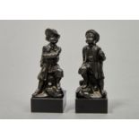 A PAIR OF FRENCH MINIATURE CAST IRON STATUETTES OF BOYS IN THE GUISE OF    EUROPEAN OR TURKISH