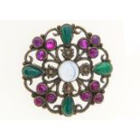 AN ARTS AND CRAFTS CRYSOPRASE, AMETHYST AND MOONSTONE PASTE SET SILVER BROOCH BY SIBYL DUNLOP,