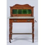A LATE VICTORIAN SATIN WALNUT WASHSTAND, C1890, THE GREEN TILED BACK WITH SHAPED CORNICE AND SWEPT