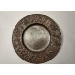 A GERMAN HISTORISMUS CAST IRON ROSEWATER DISH, LATE 19TH C, THE BORDER DECORATED IN RELIEF WITH A