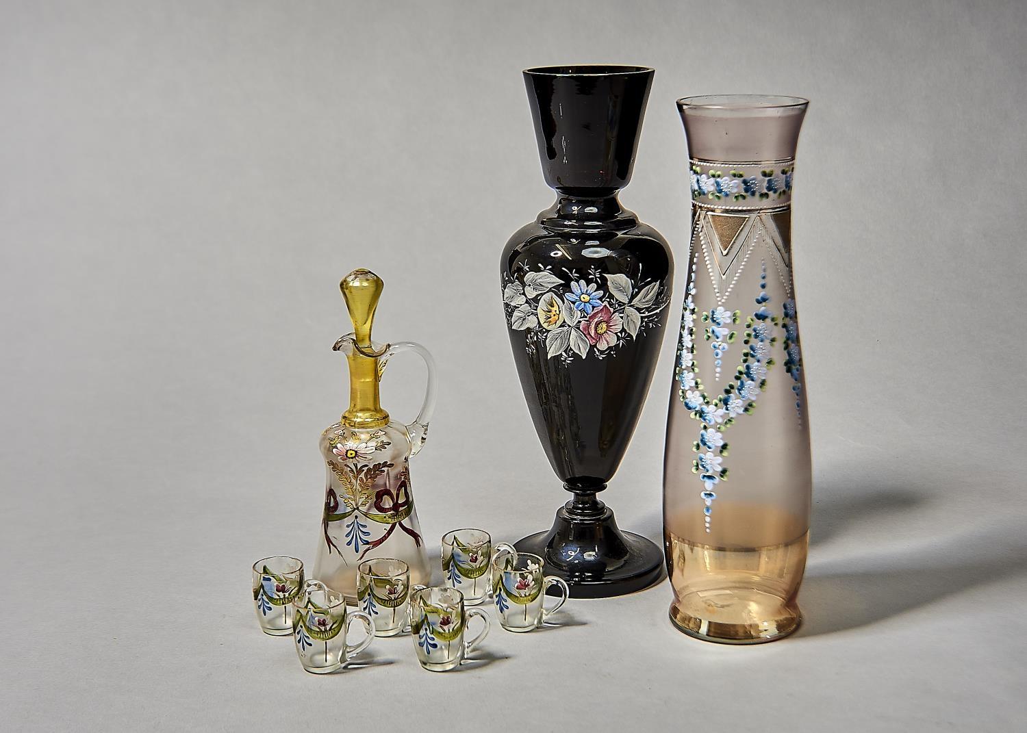 A FRENCH ENAMELLED GLASS LIQUER SET, C1910, DECORATED WITH FESTOONS AND FLOWERS, EWER AND STOPPER