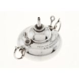 A GEORGE V SILVER CIGAR LAMP, OF COMPRESSED GLOBULAR FORM WITH DOMED TOP AND C-SCROLL HANDLES,