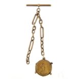 GOLD COIN.  SOVEREIGN 1887 SUSPENDED FROM A SHORT LENGTH OF GOLD CHAIN AND  T BAR, UNMARKED, 20G