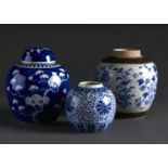A CHINESE PRUNUS-ON-CRACKED-ICE BLUE AND WHITE GINGER JAR AND COVER AND TWO OTHERS, EARLY 20TH C AND