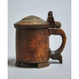 A NORWEGIAN BIRCH  TANKARD, C1800, THE DOMED LID CARVED WITH A LION AND SIMILAR THUMBPIECE ABOVE THE