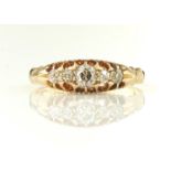 A VICTORIAN FIVE STONE DIAMOND RING, WITH OLD CUT DIAMONDS, THAT TO THE CENTRE WEIGHING APPROX 0.