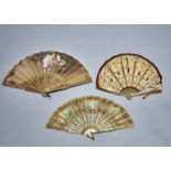 A CONTINENTAL FAN, C1880, THE LIGHT BROWN SILK LEAF PAINTED WITH A PIERROT OR THREE CHILDREN DRESSED