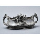 A PERRON. AN ART NOUVEAU PEWTER JARDINIERE, C1900, THE SIDES CAST WITH NYMPHS AND LILIES,