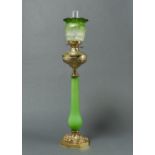 A VICTORIAN BRASS OIL LAMP, LATE 19TH C, WITH FROSTED  GREEN GLASS PILLAR, THE OGEE FOUNT EMBOSSED