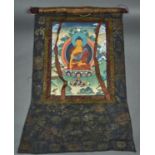 THANKA, EARLY 20TH C, THE CHINESE DARK BLUE GROUND WOVEN SILK SURROUND WITH SHOU CHARACTERS AND