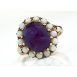 AN AMETHYST AND OPAL CLUSTER RING IN 9CT GOLD, BIRMINGHAM, DATE LETTER RUBBED, 4.3G, SIZE P Amethyst