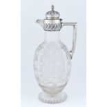 A VICTORIAN SILVER MOUNTED CUT GLASS CLARET JUG, WITH WRYTHEN FLUTED BIRD'S KNOP, BUN LID AND