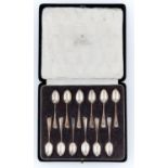 A SET OF TWELVE GEORGE V SILVER COFFEE SPOONS, OLD ENGLISH PATTERN, BY JOSIAH WILLIAMS & CO,