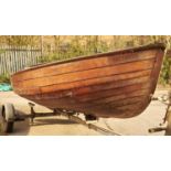 A 15 FOOT KYLES OF BUTE SAILING DINGHY BELIEVED TO HAVE BEEN BUILT BY SMITH'S BOATYARD,