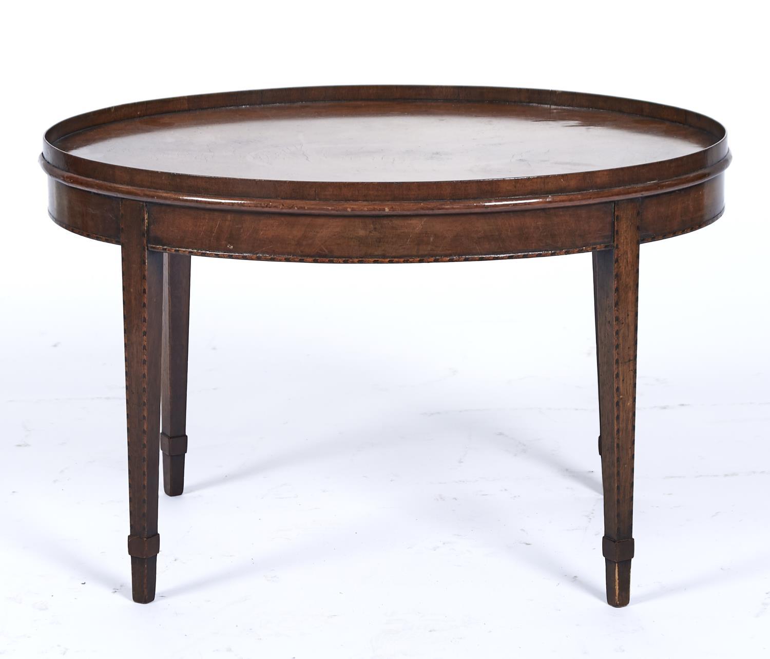 A REPRODUCTION MAHOGANY OVAL COFFEE TABLE IN GEORGE III STYLE, C1970'S, THE GALLERY FIGURE TOP ABOVE