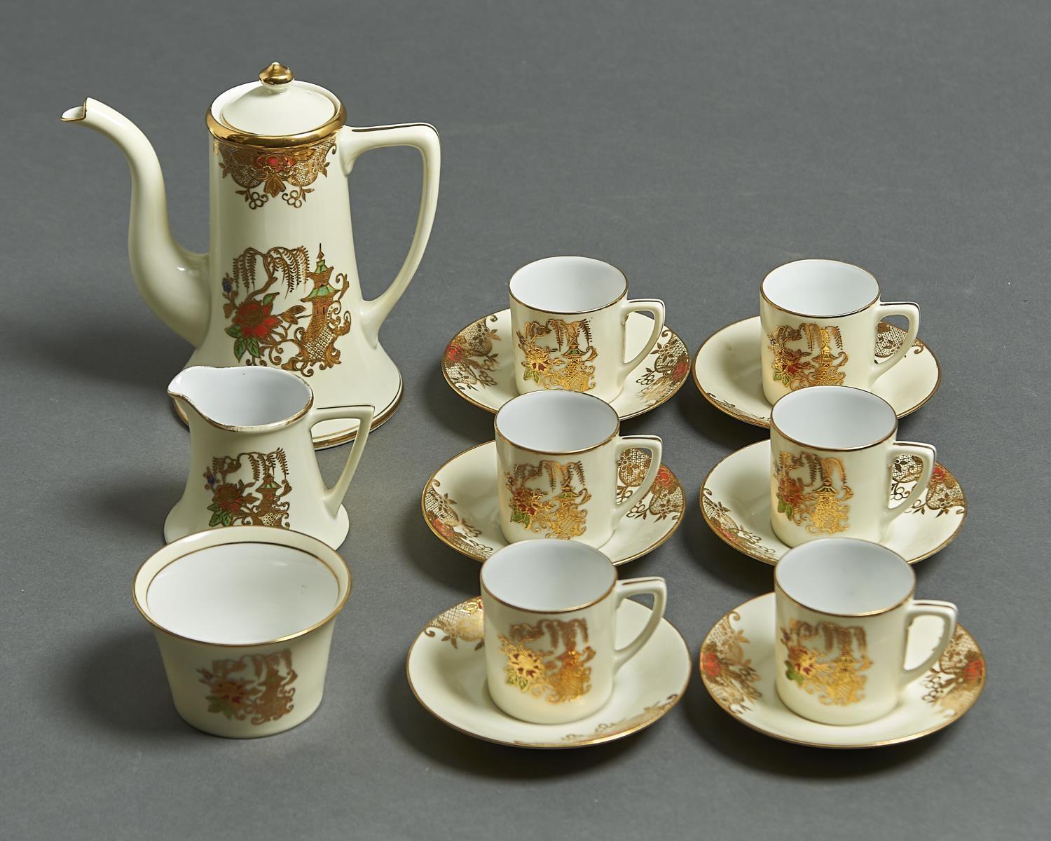 A NORITAKE COFFEE SERVICE, MID 20TH C, WITH RED, GREEN, BLUE AND RAISED GILT PAGODA AND FLOWER