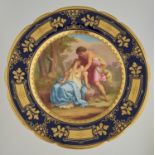 A VIENNA STYLE DESSERT STAND, PAINTED WITH CLASSICAL LOVERS IN COBALT BORDER, RAISED GILT PANELS AND