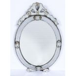A VENETIAN OVAL MIRROR, LATE 19TH C, WITH PIERCED CRESTING AND GLASS FLOWERHEAD BOSSES, THE BEVELLED