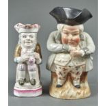 A CONTINENTAL POTTERY SNUFF TAKER TOBY JUG AND A SMALLER FRENCH FAIENCE TOBY JUG, LATE 19TH /