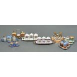 TWO NORITAKE AND SIX OTHER JAPANESE PORCELAIN CONDIMENT SETS, EARLY 20TH C, VARIOUSLY DECORATED,